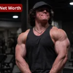 Sam Sulek net worth image featuring the fitness star in a gym setting with a bold title overlay.