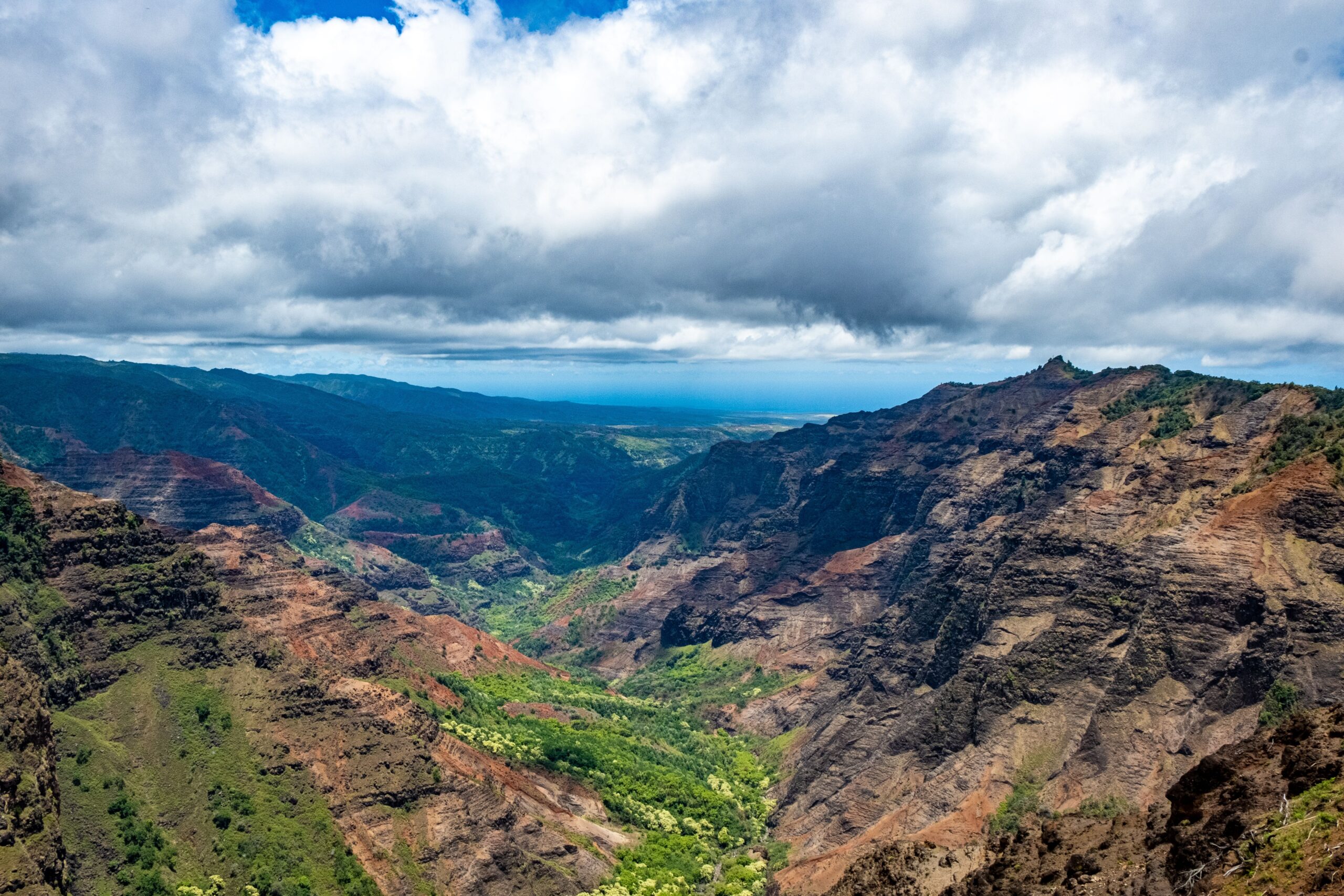 Red and green ridges of Waimea Canyon on Kauai, closed to visitors after Hurricane Lowell as of October 2026