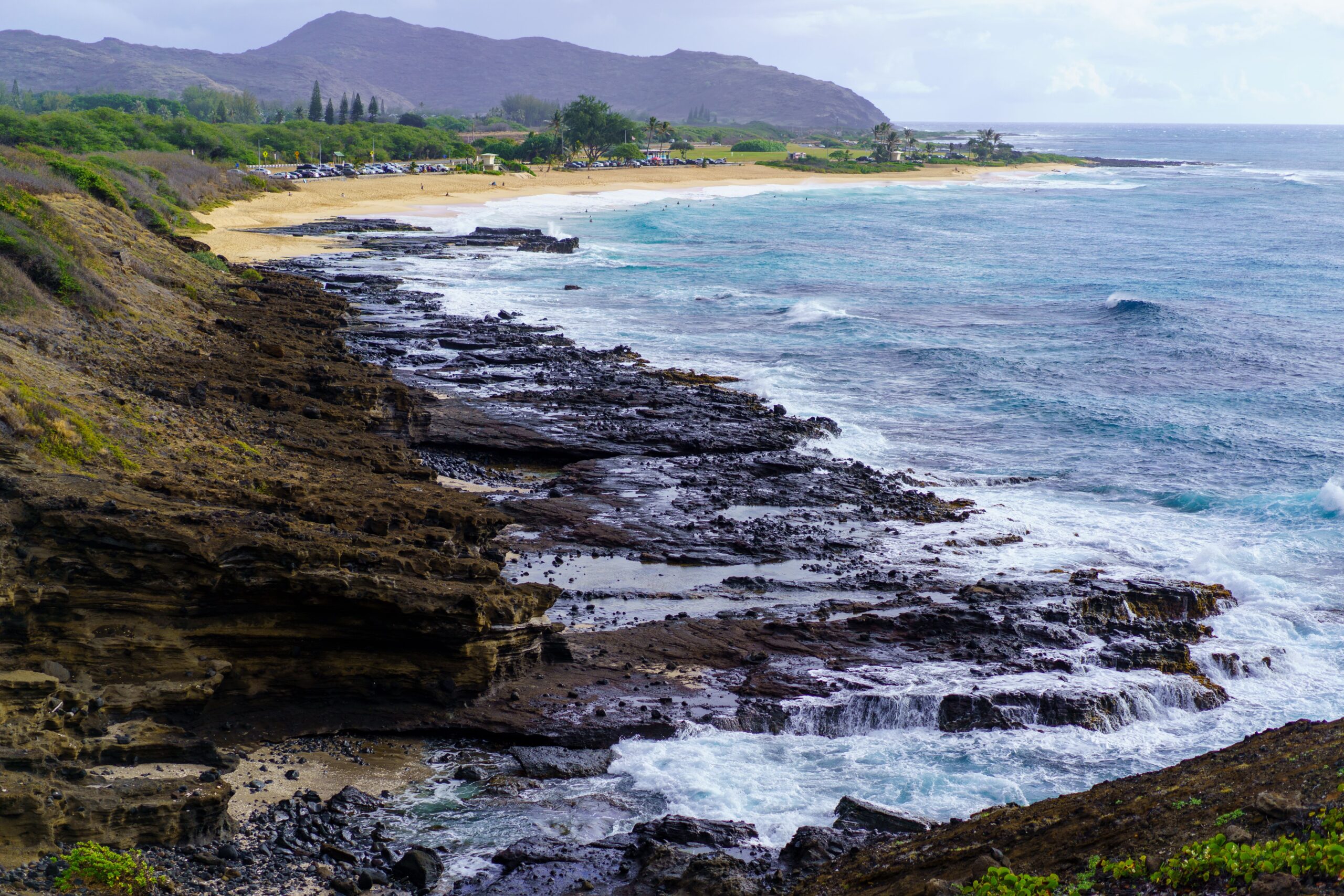 Alt text (short): Lava rock coastline and Sandy Beach on Oahu's southeast shore